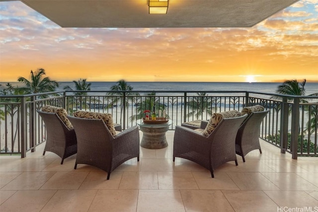 balcony at dusk with a water view