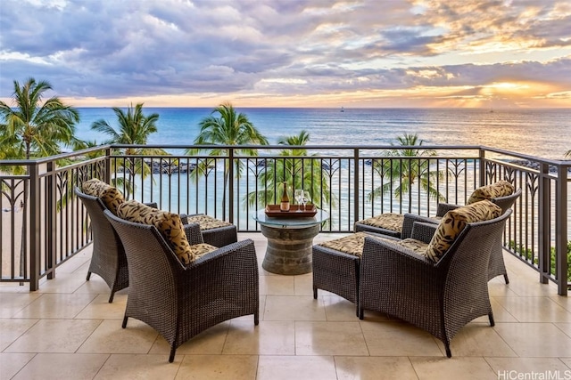 balcony at dusk with a water view