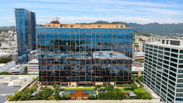 view of building exterior with a mountain view