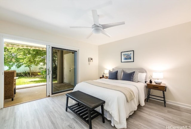 bedroom with light hardwood / wood-style floors, ceiling fan, and access to outside