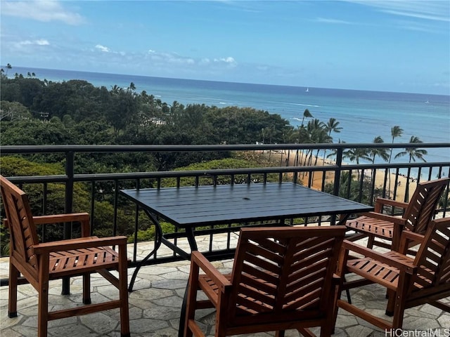 balcony featuring a patio and a water view