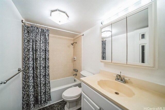 full bathroom featuring shower / bath combination with curtain, vanity, and toilet