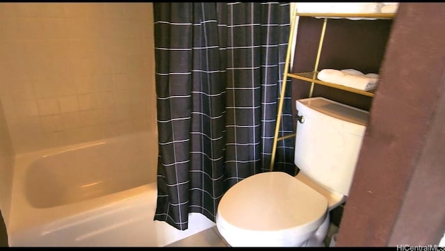 full bathroom with shower / bath combo and toilet