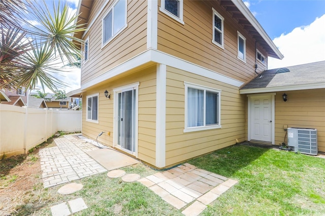 87-1980 Pakeke St Unit J, Waianae, HI 96792 - rear view of property featuring cooling unit and a patio
