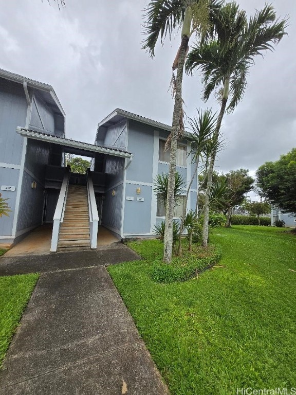 view of front of home with a front lawn