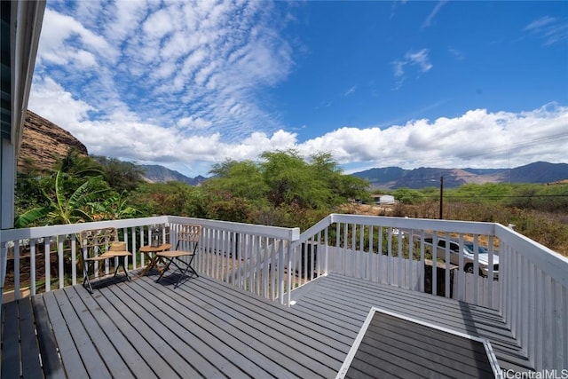 deck with a mountain view