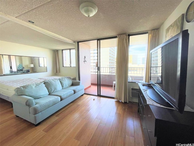 2240 Kuhio Ave Unit 1210, Honolulu, HI 96815 - living area featuring a textured ceiling and wood finished floors