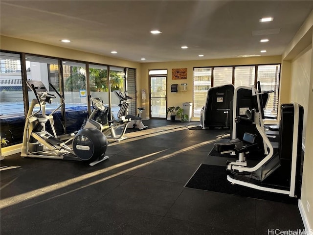 workout area with recessed lighting