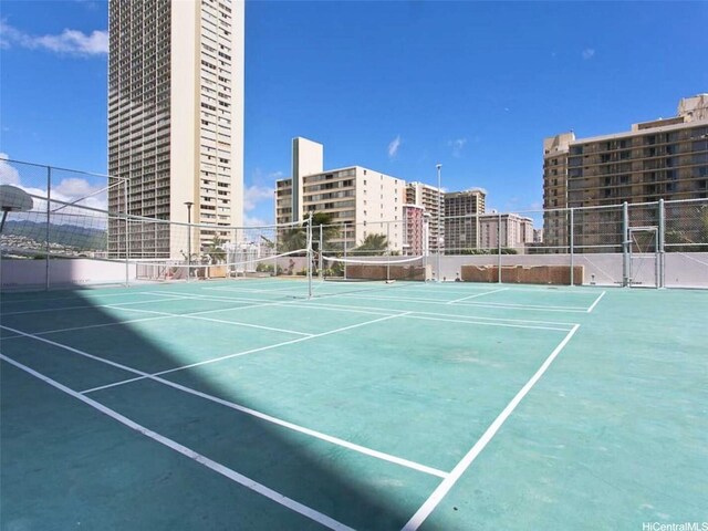 2240 Kuhio Ave Unit 1210, Honolulu, HI 96815 - view of tennis court featuring a city view
