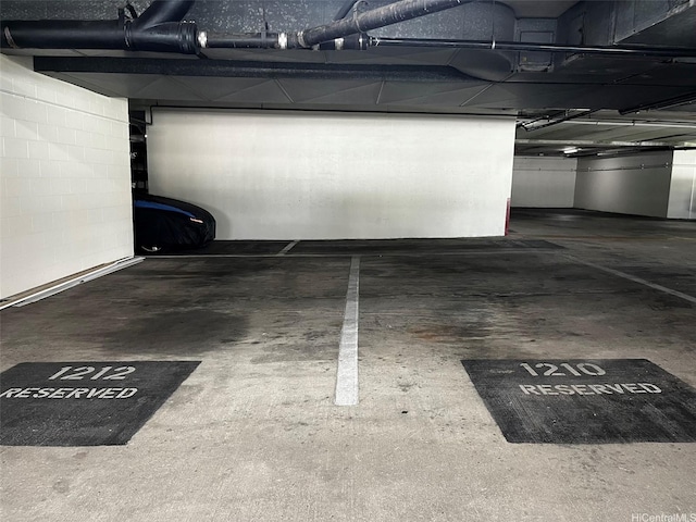 2240 Kuhio Ave Unit 1210, Honolulu, HI 96815 - parking deck featuring concrete block wall