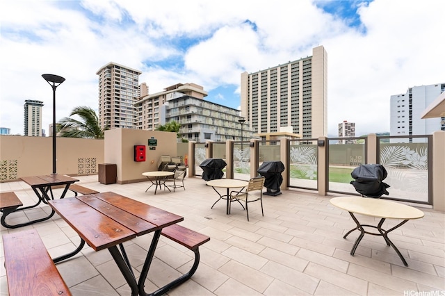 2240 Kuhio Ave Unit 1210, Honolulu, HI 96815 - view of patio featuring a view of city and area for grilling
