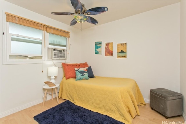 bedroom featuring ceiling fan and light hardwood / wood-style flooring