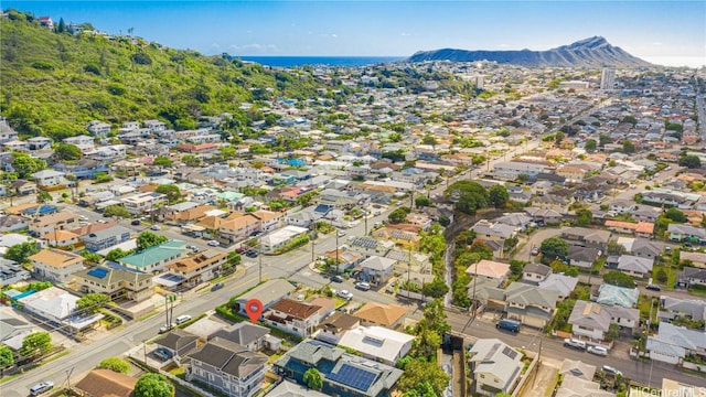 drone / aerial view featuring a mountain view