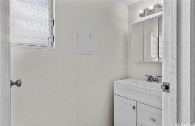 bathroom featuring vanity and electric panel