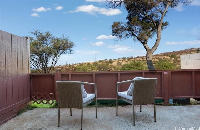 view of patio with fence