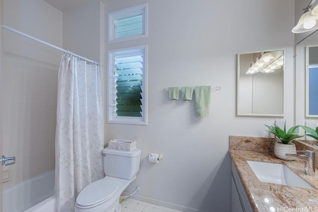 full bathroom with shower / bath combo with shower curtain, vanity, and toilet