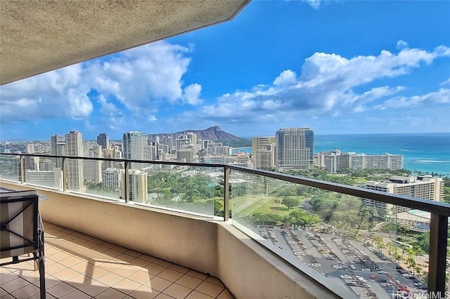 balcony featuring a water view