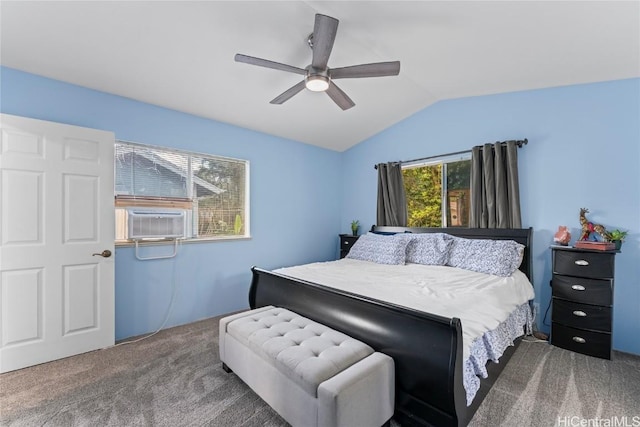 carpeted bedroom with cooling unit, multiple windows, ceiling fan, and vaulted ceiling