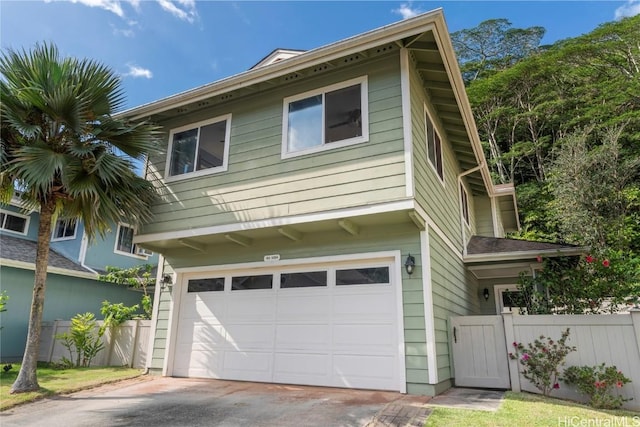 view of side of property featuring a garage