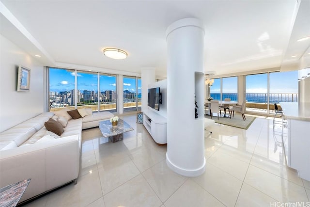 tiled living room with expansive windows