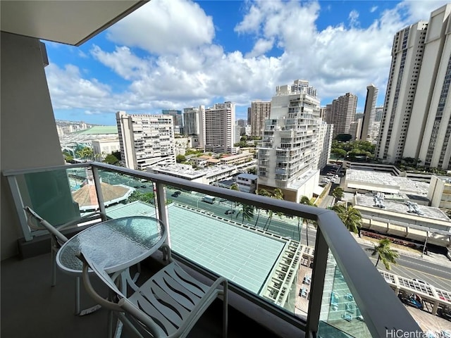 balcony featuring a city view