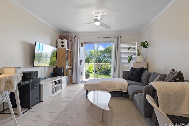 living room with ceiling fan and ornamental molding