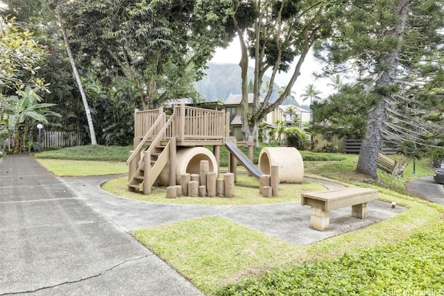 view of play area featuring a lawn