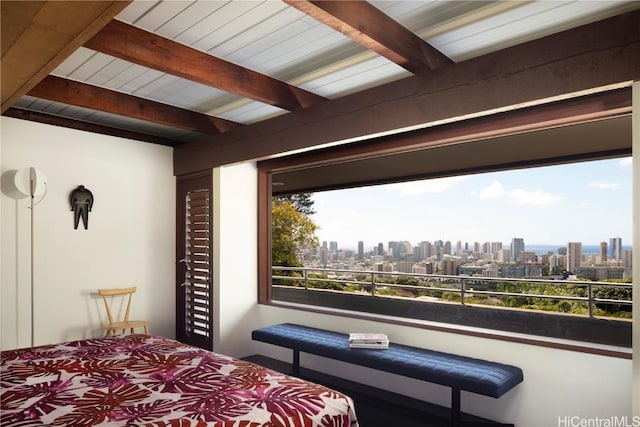 bedroom with beam ceiling