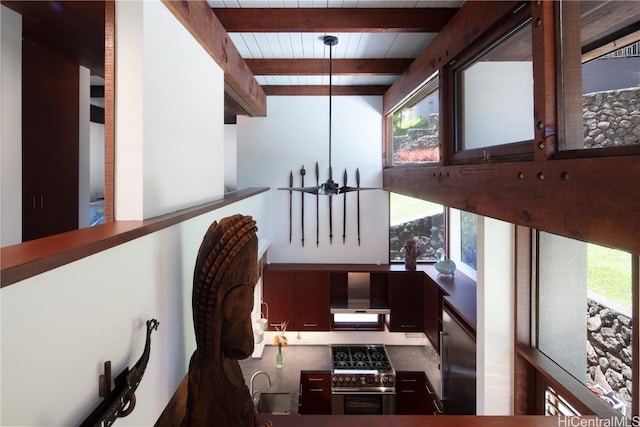 interior space with beamed ceiling and sink