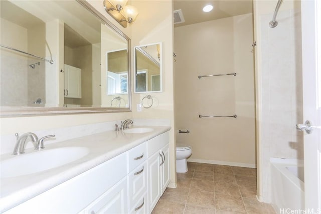 bathroom with tile patterned floors, toilet, and vanity