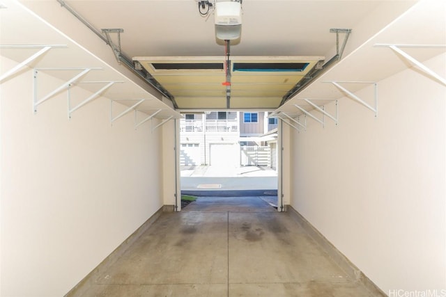 garage featuring a garage door opener