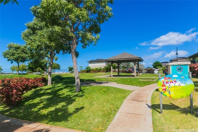 view of community featuring a gazebo and a yard