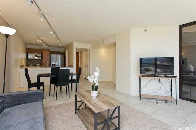 60 N Beretania St Unit 2008, Honolulu, HI 96817 - living room with light tile patterned flooring and a textured ceiling