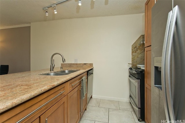 60 N Beretania St Unit 2008, Honolulu, HI 96817 - kitchen with stainless steel appliances, a textured ceiling, a sink, light tile patterned flooring, and brown cabinets