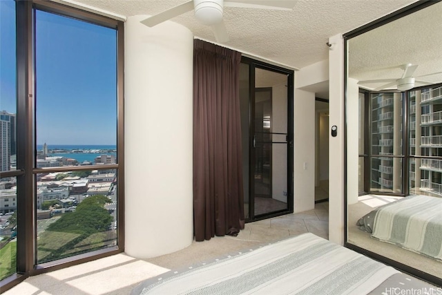 60 N Beretania St Unit 2008, Honolulu, HI 96817 - tiled bedroom with expansive windows and a textured ceiling