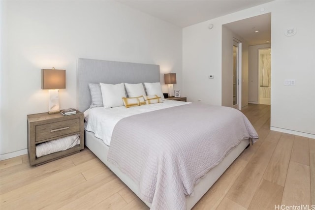 bedroom featuring light wood-type flooring