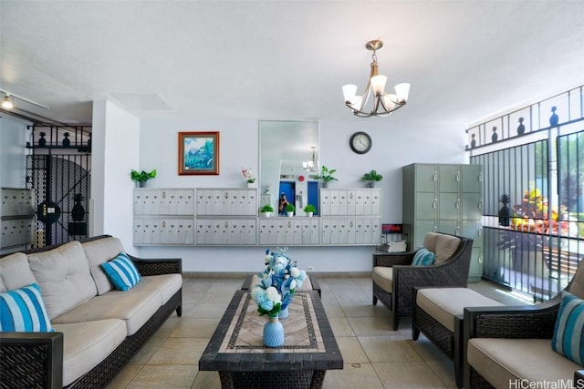 interior space with mail boxes, light tile patterned floors, and a notable chandelier