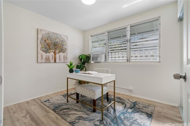 office area featuring light hardwood / wood-style flooring and cooling unit