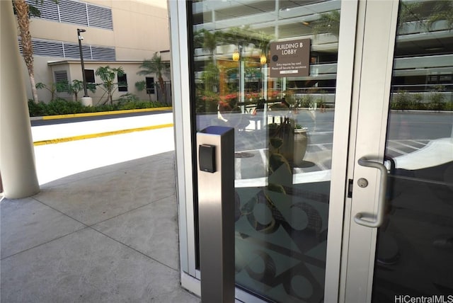 doorway to outside featuring concrete flooring