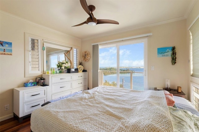 bedroom with a water view, dark hardwood / wood-style floors, access to exterior, and crown molding