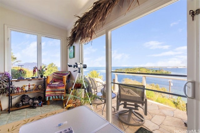 sunroom with a water view