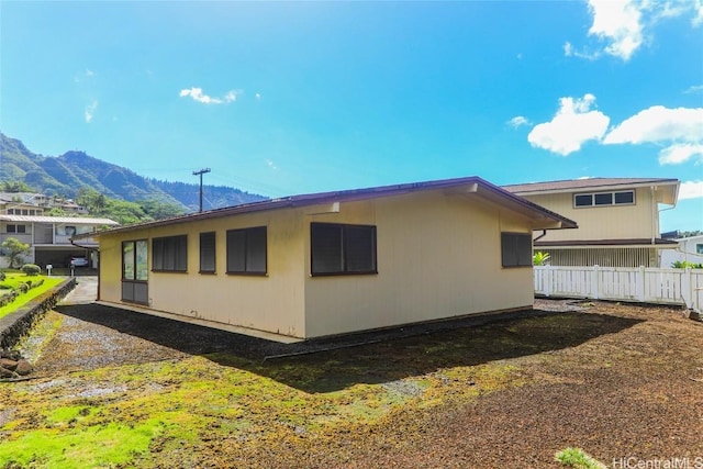 view of home's exterior featuring a mountain view