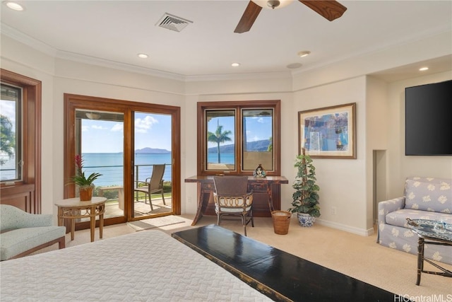 carpeted bedroom with access to outside, multiple windows, visible vents, and baseboards