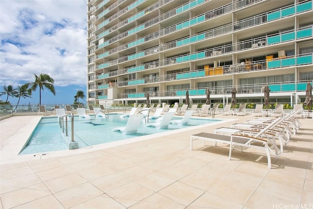 view of swimming pool featuring a patio