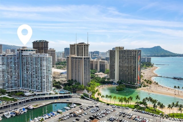 property's view of city featuring a water view