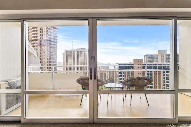 doorway to outside featuring a view of city