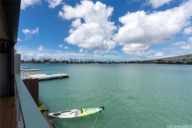 view of water feature with a dock