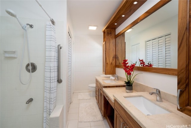 bathroom featuring tile patterned floors, vanity, toilet, and a shower with shower curtain