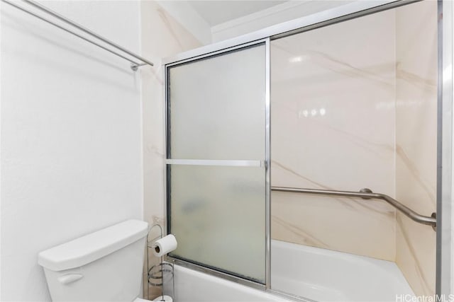 bathroom with toilet and enclosed tub / shower combo