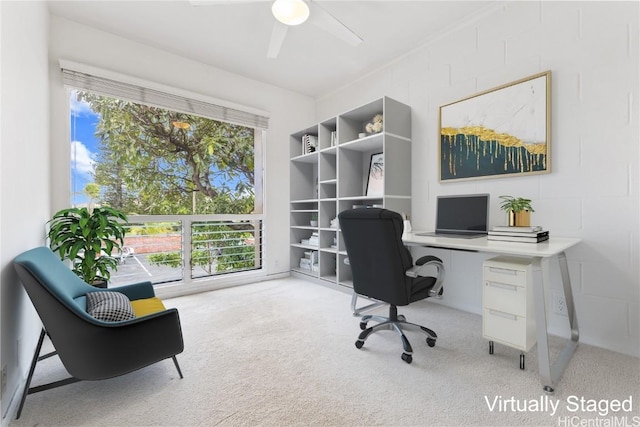 office space with ceiling fan and light colored carpet